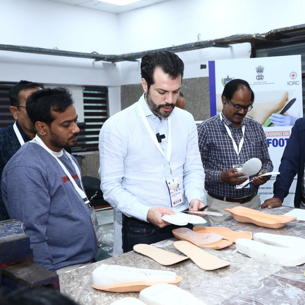 trainer with diabetic foot course participants
